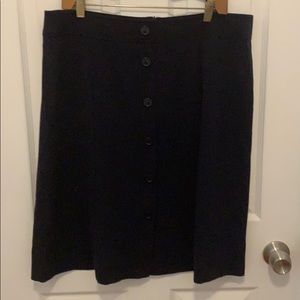 Navy a-line skirt with black buttons